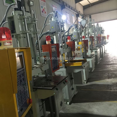Machines de moulage par injection verticale