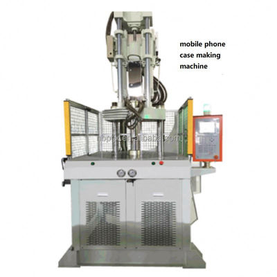 Machine de moulage par injection verticale
